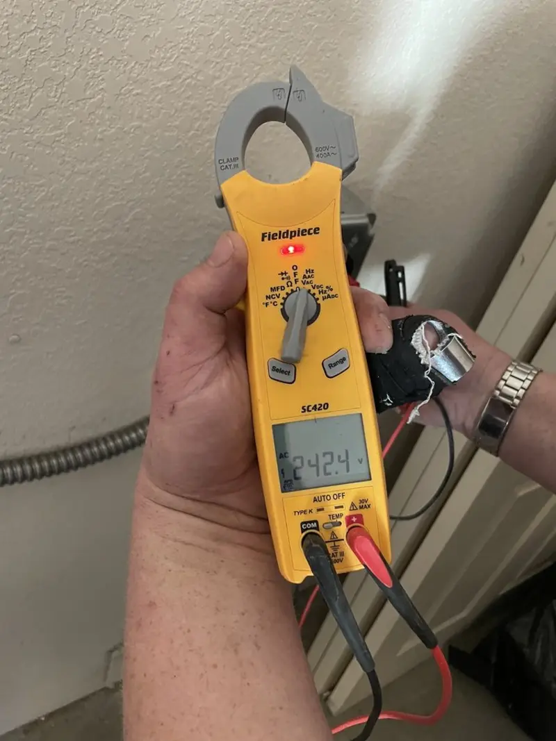 Voltage testing with clamp meter during Electrical Installation Services in Walnut Park